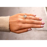 Oval Cut Solitaire Engagement Ring with Diamond Pavé
