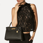 Kelly Retourne in Black by Hermès - Hermes