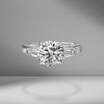Round Brilliant Cut Engagement Ring with Tapered Baguettes
