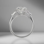 Round Brilliant Cut Engagement Ring with Tapered Baguettes