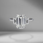 Emerald Cut Engagement Ring with Trapezoids