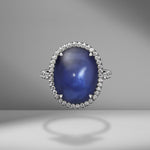 Oval Cabochon Sapphire Ring with diamond pavé