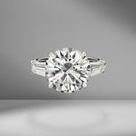 Round Brilliant Cut Engagement Ring with Tapered Baguettes