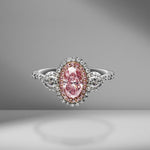 Pink Oval Cut Diamond Ring with Pear Shapes