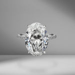 Oval Cut Solitaire Engagement Ring with Diamond Pavé