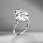 Oval Cut Solitaire Engagement Ring with Diamond Pavé