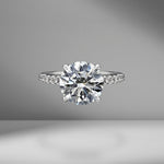 Round Brilliant Cut Engagement Ring with Pavè Band